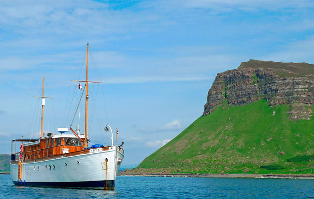 Chico at anchor, slow displacement cruising